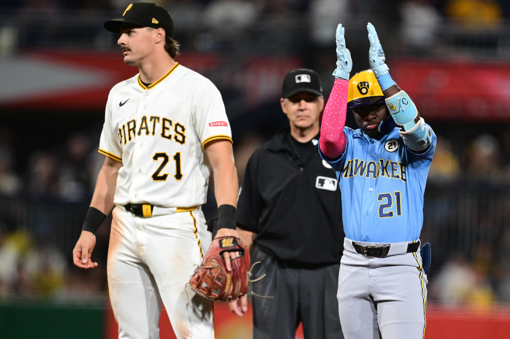 Milwaukee Brewers' Luis Lara celebrates after hitting an RBI double during the sixth inning of a baseball game against the Pittsburgh Pirates, Tuesday, Sept. 15, 2026, in Pittsburgh. (AP Photo/David Dermer)