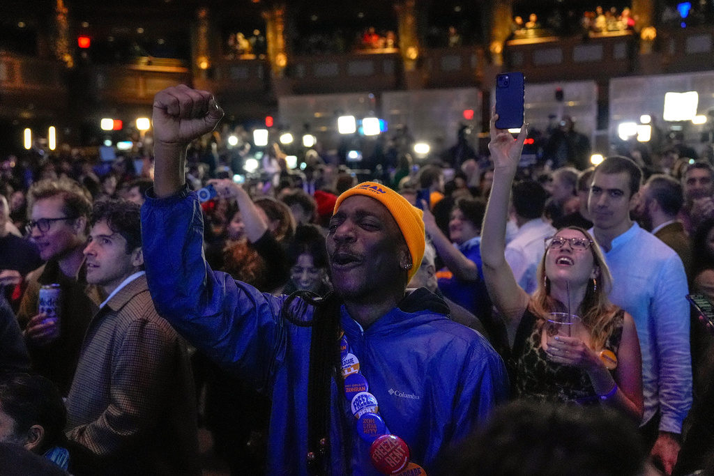 Supporters for Democratic mayoral candidate Zohran Mamdani react as they watch returns during an election night watch party, Tuesday, Nov. 4, 2025, in New York. (AP Photo/Yuki Iwamura)