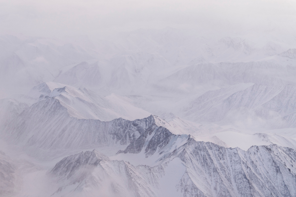 FILE - Snow covers the mountains of the Brooks Range in the Arctic National Wildlife Refuge, Oct. 14, 2024, near Kaktovik, Alaska. (AP Photo/Lindsey Wasson, File)