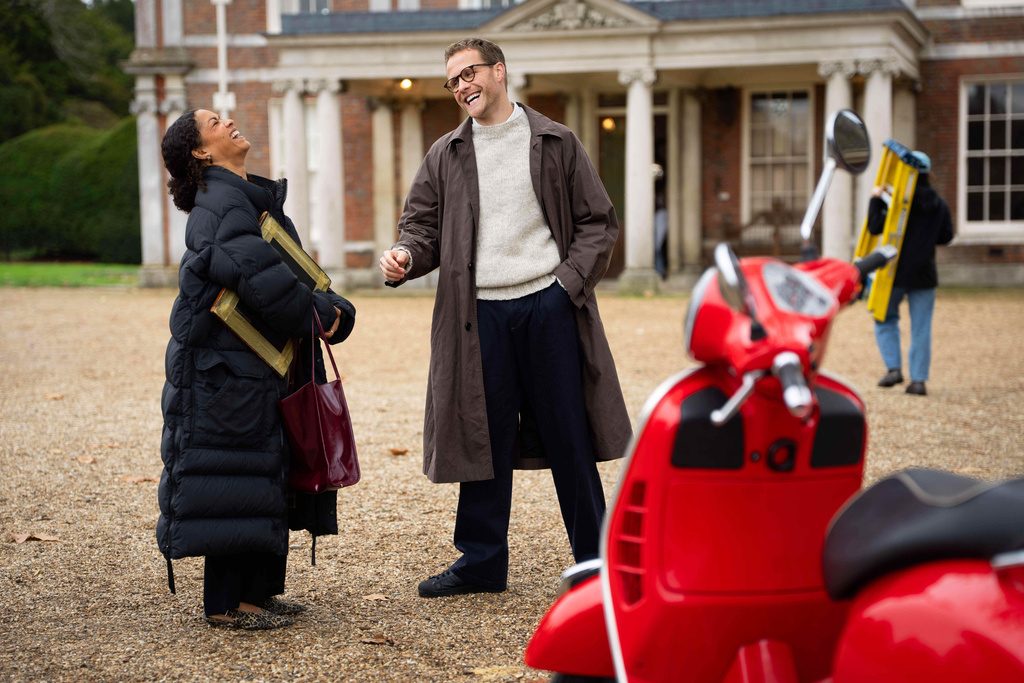 Antonia Thomas, left, and and Josh Dylan appear on the set of the Agatha Christie series "Tommy & Tuppence" in Beaconsfield, England on Wednesday, Oct. 29, 2025. (Photo by Scott A Garfitt/Invision/AP)