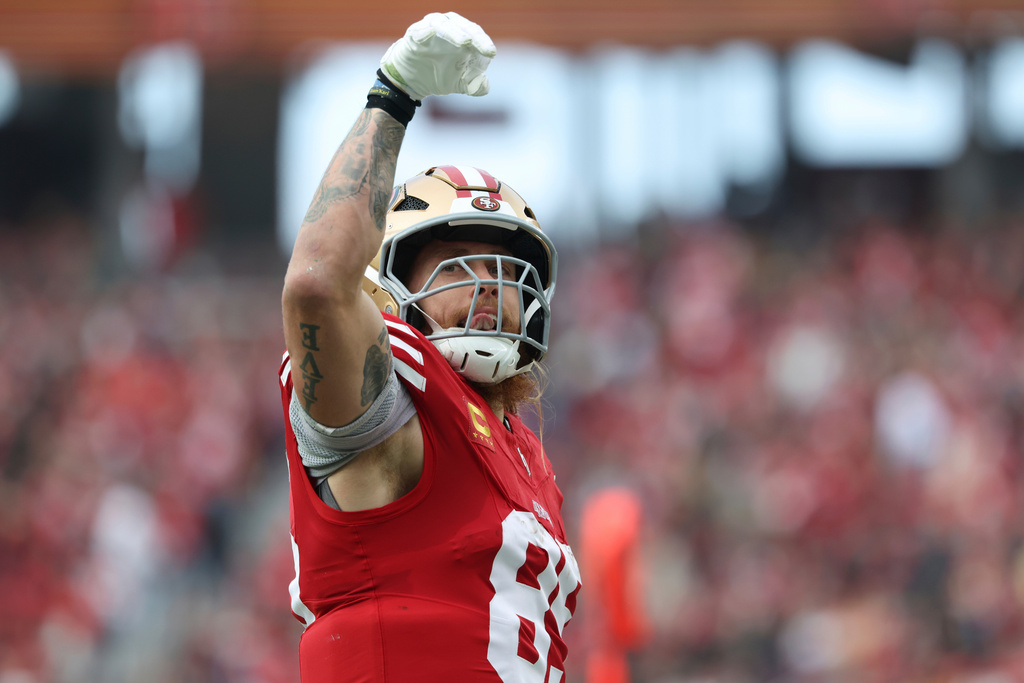 San Francisco 49ers tight end George Kittle (85) celebrates a first down catch during the first half of an NFL football game against the Tennessee Titans, Sunday, Dec. 14, 2025, in Santa Clara, Calif. (AP Photo/Jed Jacobsohn)