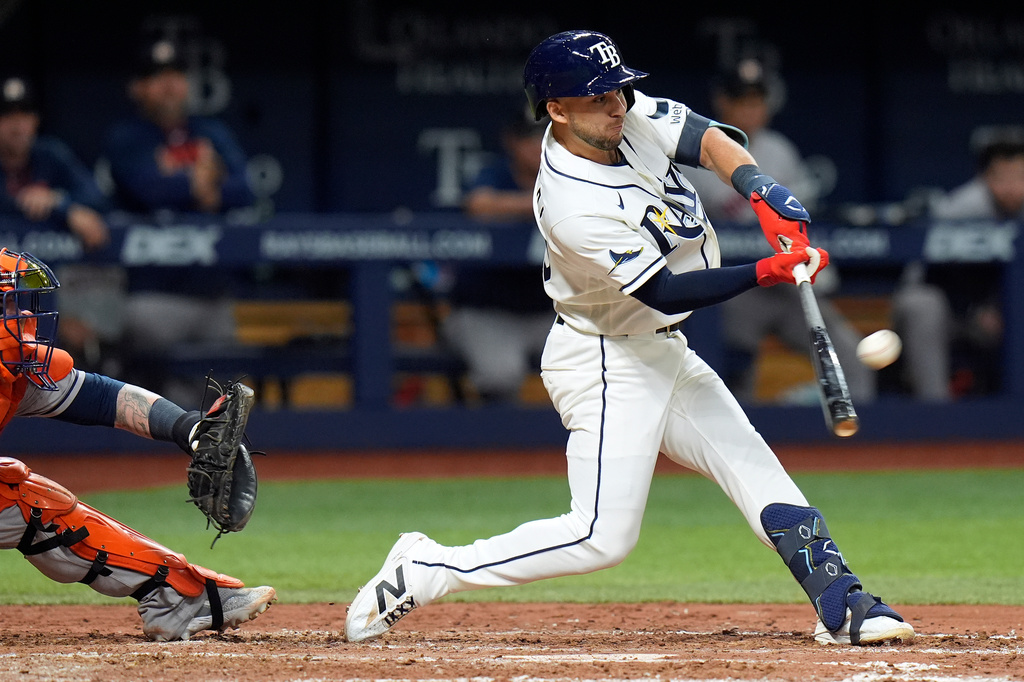 Tampa Bay Rays' Nick Madrigal connects for a run scoring sacrifice fly off Houston Astros pitcher Bennett Sousa during the seventh inning of a baseball game Saturday, Sept. 12, 2026, in St. Petersburg, Fla. (AP Photo/Chris O'Meara)