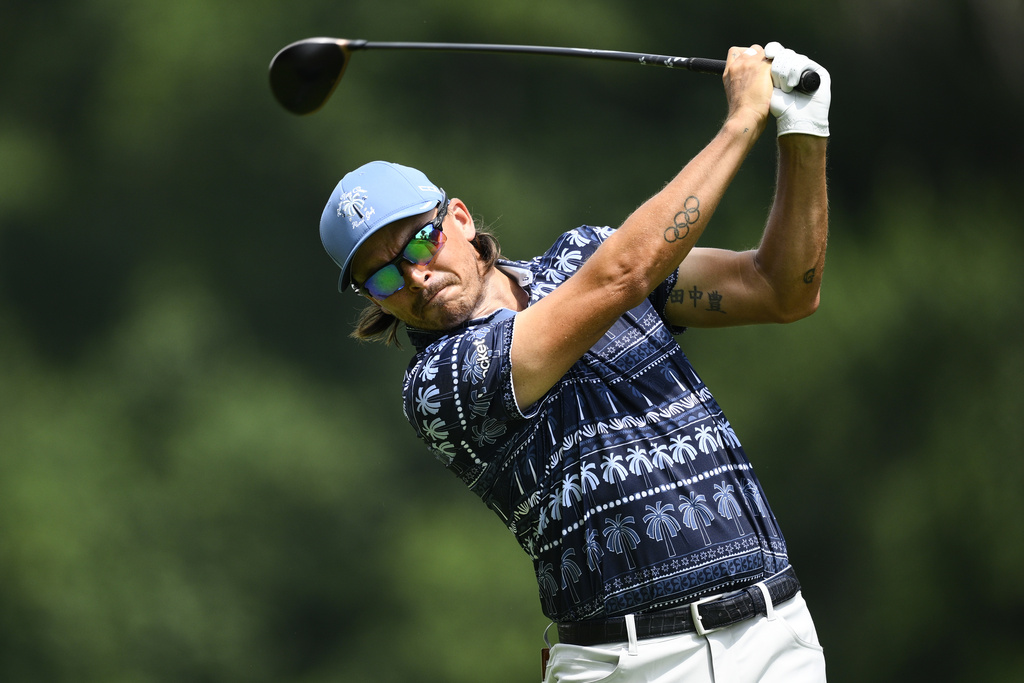 Rickie Fowler hits from the seventh tee during the first round of the BMW Championship golf tournament Thursday, Aug. 14, 2025, in Owings Mills, Md. (AP Photo/Nick Wass)