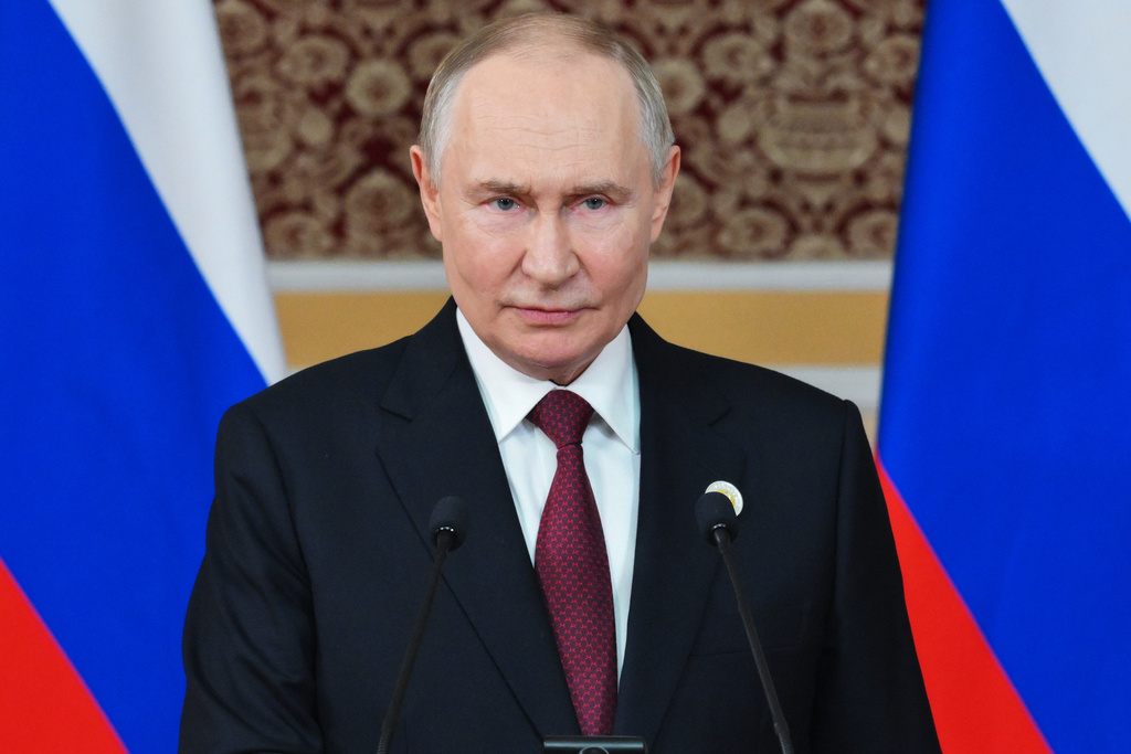 Russian President Vladimir Putin holds a news conference after the summit of the Commonwealth of Independent States in Dushanbe, Tajikistan, Friday, Oct. 10, 2025. (Grigory Sysoyev, Sputnik, Kremlin Pool Photo via AP)