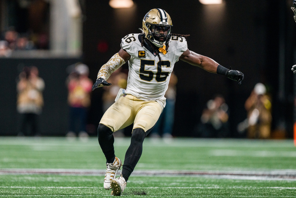 FILE - New Orleans Saints linebacker Demario Davis works during the second half of an NFL football game against the Atlanta Falcons, Jan. 4, 2026, in Atlanta. (AP Photo/Danny Karnik, file)