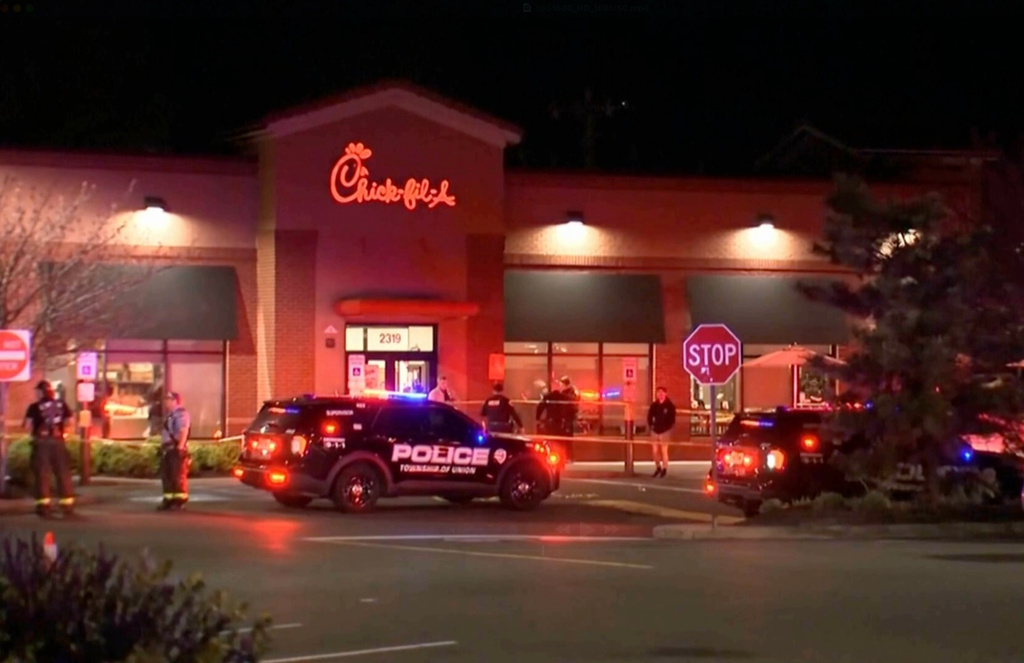 In this image taken from video, police are on the scene of a shooting at a Chick-fil-A restaurant, Saturday, April 11, 2026, in Union, New Jersey. (WABC via AP)