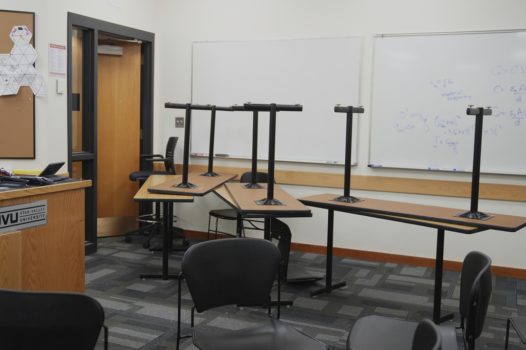 Chairs and tables are stacked in a classroom a day after the shooting of Charlie Kirk at Utah Valley University in Orem, Utah, Thursday, Sept. 11, 2025. (AP Photo/Lindsey Wasson)