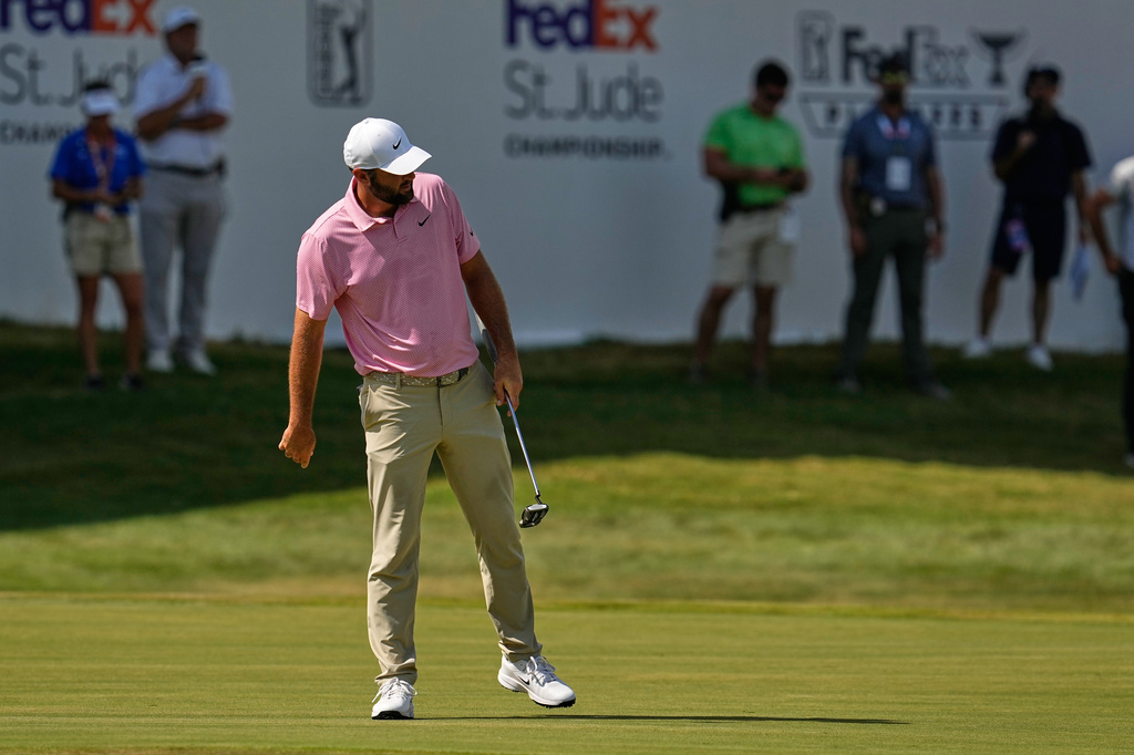 Scottie Scheffler misses a birdie try on the 18th hole during the second round of the St. Jude Championship golf tournament Friday, Aug. 14, 2026, in Memphis, Tenn. (AP Photo/George Walker IV)