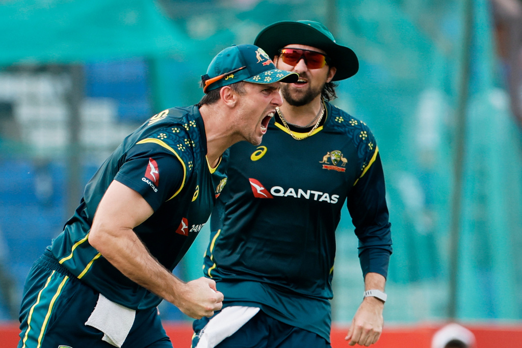 Australia's captain Mitchell Marsh reacts after taking the catch to dismiss Bangladesh's Parvez Hossain Emon during the second T20 international cricket match between Australia and Bangladesh, in Chattogram, Bangladesh, Friday, June 19, 2026. (AP Photo/Mosaraf Hossain)