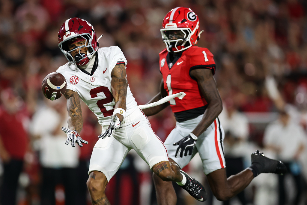 Alabama wide receiver Ryan Williams (2) drops a pass during the first half of an NCAA college football game against Georgia, Saturday, Sept. 27, 2025, in Athens, Ga. (AP Photo/Colin Hubbard)