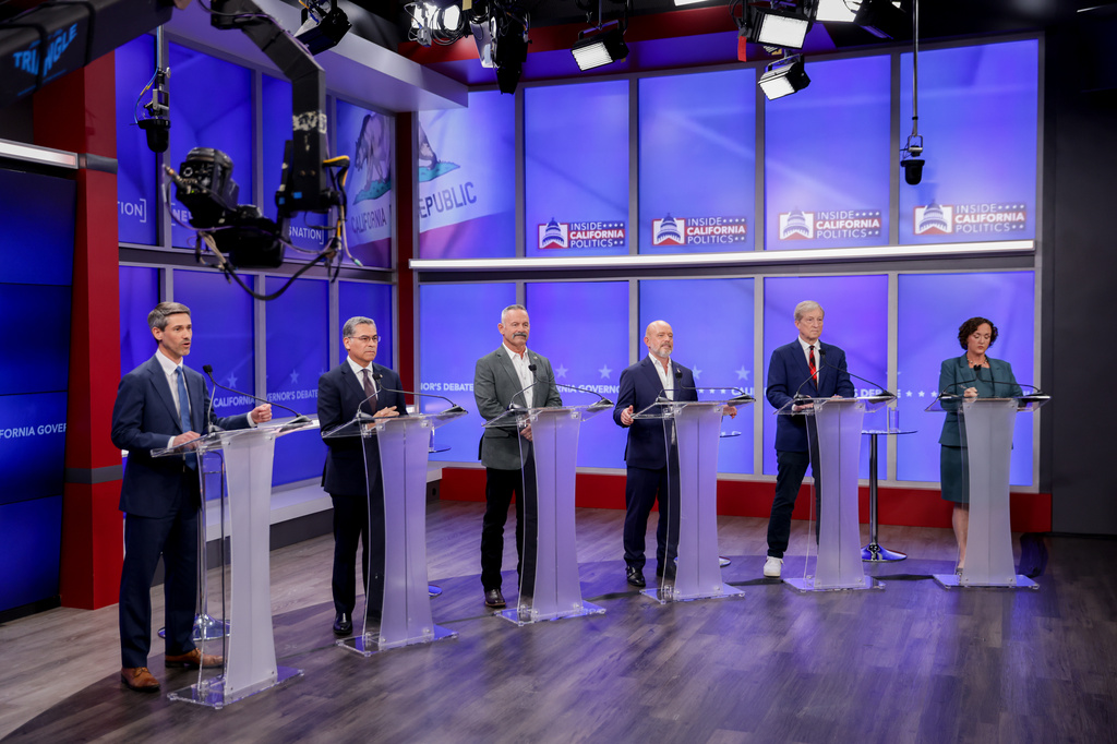 Candidates in California's gubernatorial race look on during a debate Wednesday, April 22, 2026, in San Francisco. (Jason Henry/Pool Photo via AP)