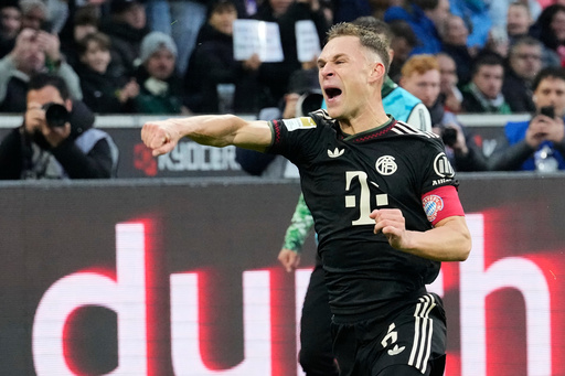 Bayern's Joshua Kimmich celebrates after scoring his side's opening goal during the German Bundesliga soccer match between Borussia Moenchengladbach and Bayern Munich in Moenchengladbach, Germany, Saturday, Oct. 25, 2025. (AP Photo/Martin Meissner) Bayern's Joshua Kimmich celebrates after scoring his side's opening goal during the German Bundesliga soccer match between Borussia Moenchengladbach and Bayern Munich in Moenchengladbach, Germany, Saturday, Oct. 25, 2025. (AP Photo/Martin Meissner)
