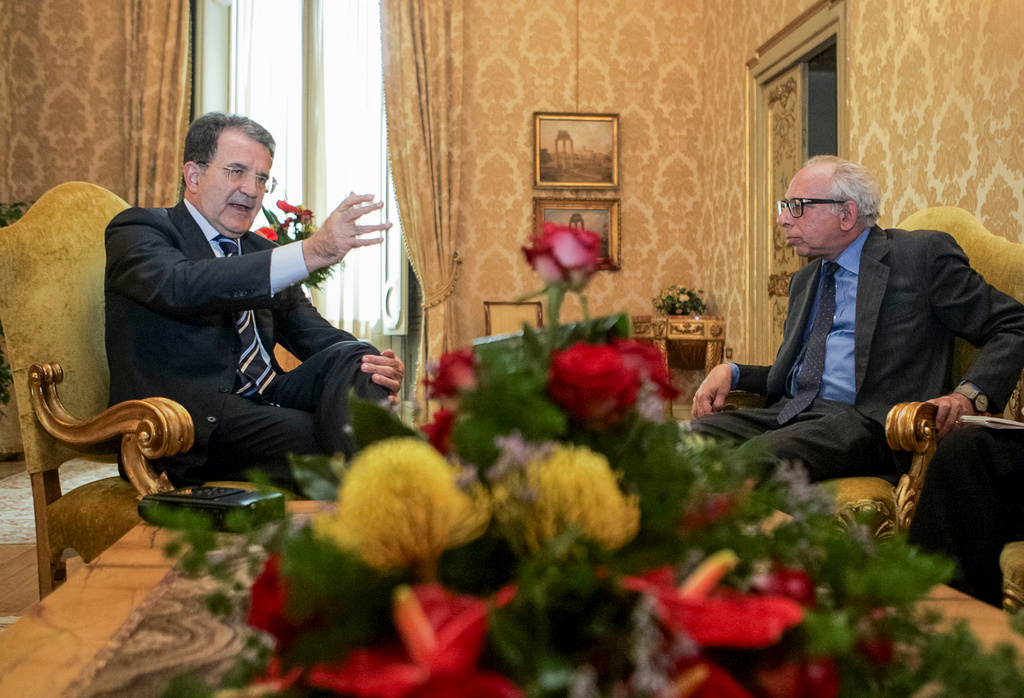 FILE - Italian Premier Romano Prodi, left, gestures as he is interviewed by Associated Press Rome Bureau Chief Victor Simpson at Chigi palace, in Rome, Wednesday, July 26, 2006. (AP Photo/Domenico Stinellis, File)