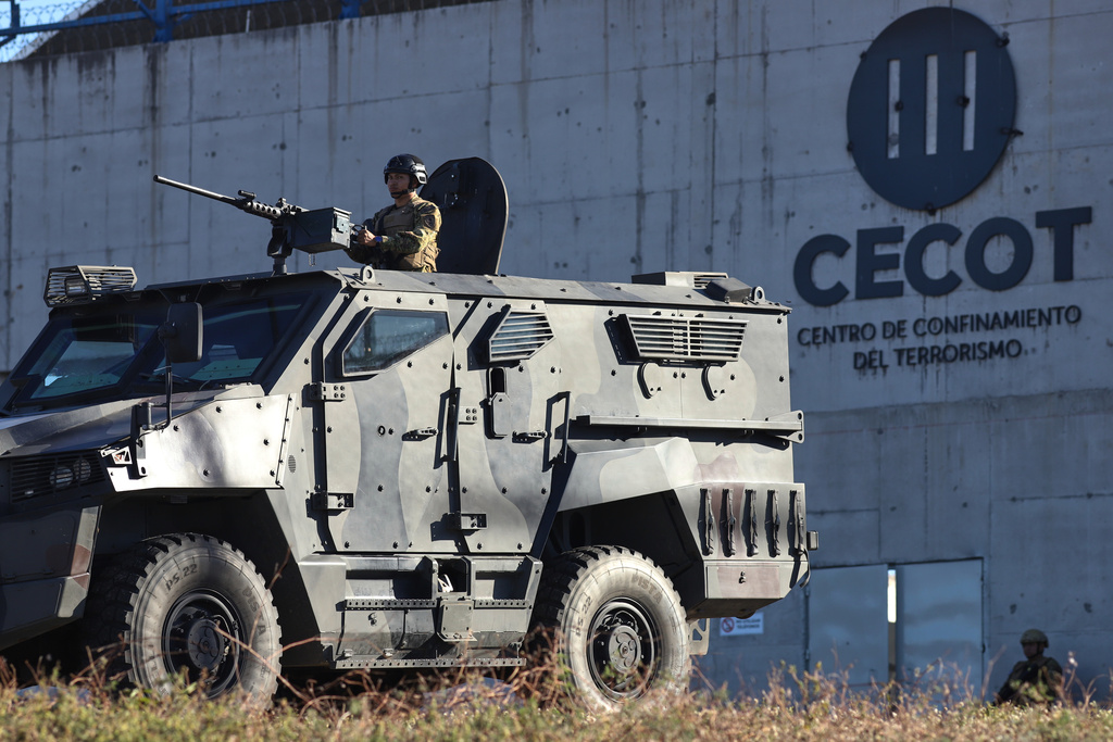 A armored vehicle is parked outside the mega prison known as Detention Center Against Terrorism (CECOT) in Tecololuca, El Salvador, Friday, Jan. 30, 2026, during a tour for Chile's President-elect Jose Antonio Kast. (AP Photo/Salvador Melendez)