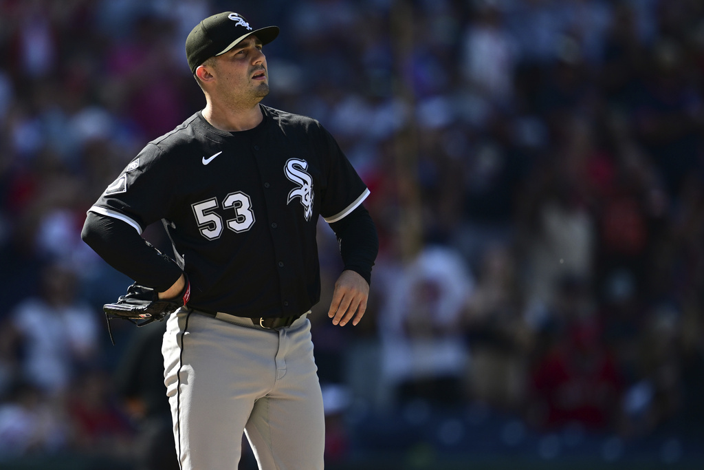 Chicago White Sox relief pitcher Brandon Eisert reacts after a solo home run by Cleveland Guardians' Bo Naylor during the seventh inning of a baseball game, Sunday, Sept. 14, 2025, in Cleveland. (AP Photo/David Dermer)
