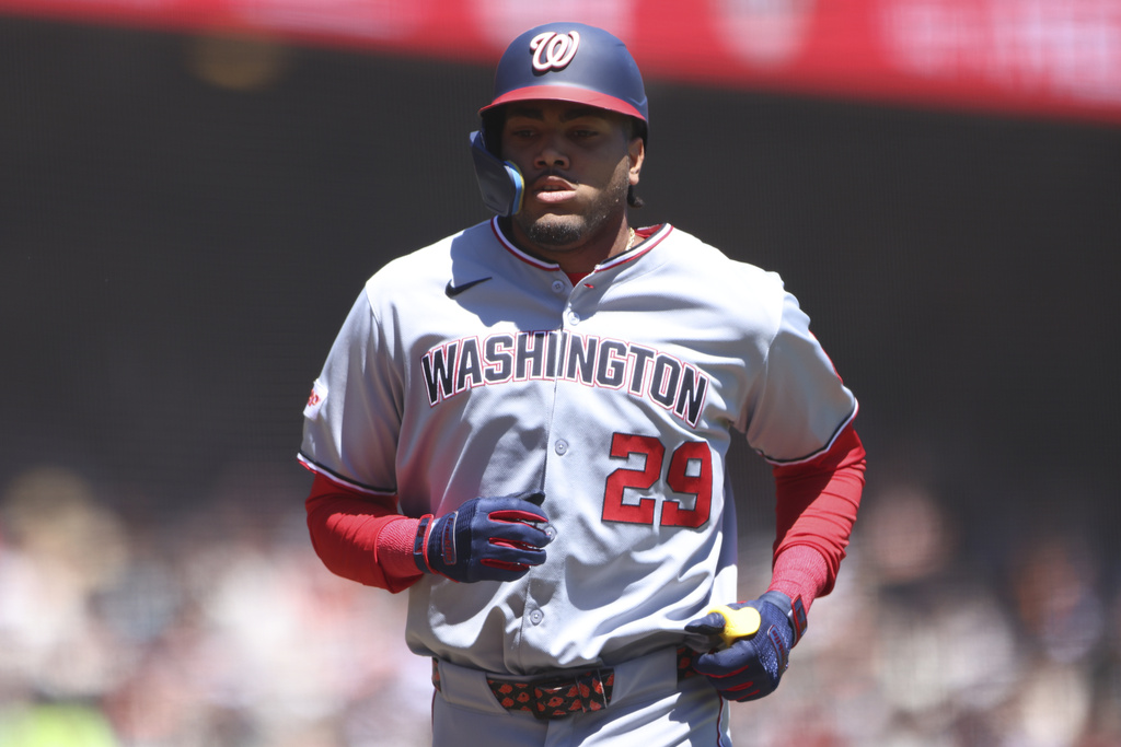 Washington Nationals' James Wood jogs around the bases after hitting a solo home run during the first inning of a baseball game against the San Francisco Giants, Saturday, Aug. 9, 2025, in San Francisco. (AP Photo/Scott Marshall)