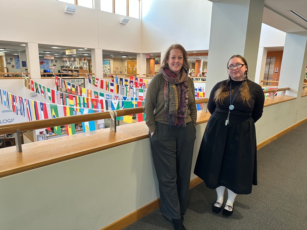 Otis Library Executive Director Cathleen Special and Young Adult Librarian Emily Gardiner, pose for a photo overlooking the atrium on Friday, Feb. 13, 2026 in Norwich, Conn. (AP Photo/Susan Haigh)