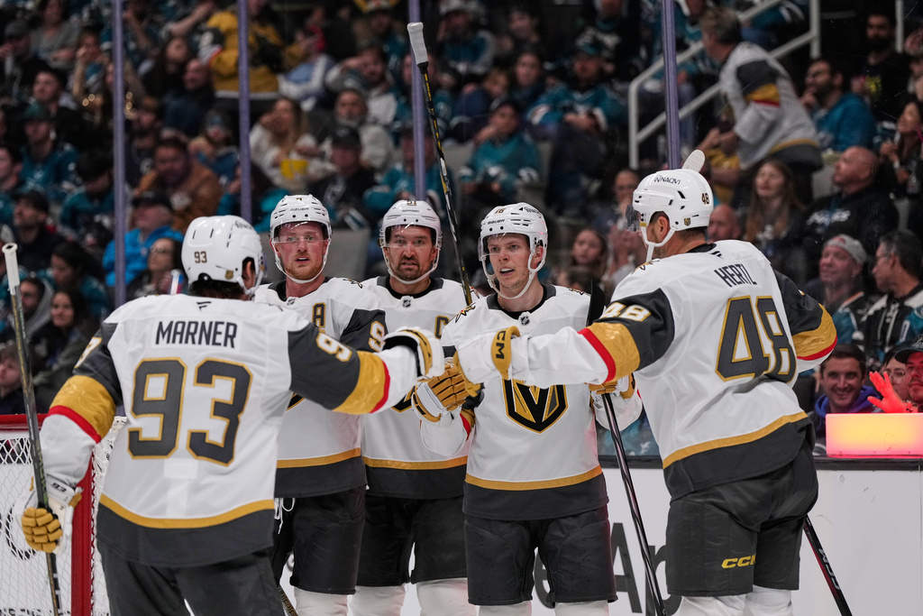 Vegas Golden Knights right wing Pavel Dorofeyev, second from right, celebrates with teammates after scoring a goal during the second period of an NHL hockey game against the San Jose Sharks, Thursday, Oct. 9, 2025, in San Jose, Calif. (AP Photo/Godofredo A. Vásquez)