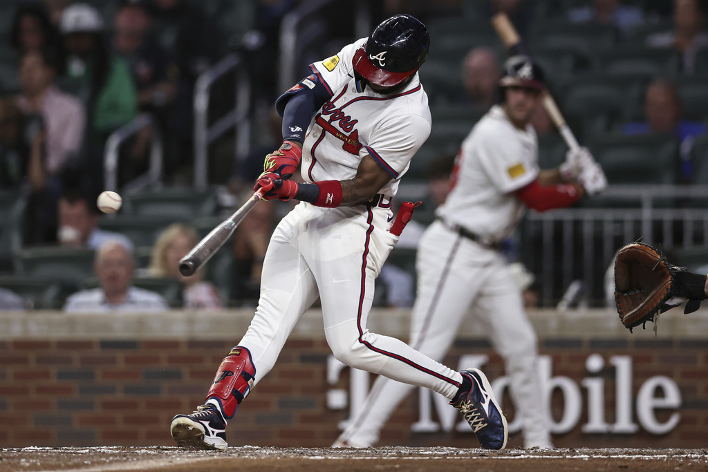 Atlanta Braves' Jurickson Profar hits an RBI single in the third inning of a baseball game against the Chicago Cubs, Tuesday, Sept. 9, 2025, in Atlanta. (AP Photo/Colin Hubbard)