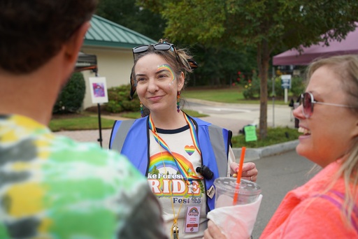 Amanda Cottrill, co-chair of Pride Fest, talks with people on the street in Wake Forest, N.C., on Saturday, Oct. 11, 2025. (AP Photo/Allen G. Breed) Amanda Cottrill, co-chair of Pride Fest, talks with people on the street in Wake Forest, N.C., on Saturday, Oct. 11, 2025. (AP Photo/Allen G. Breed)