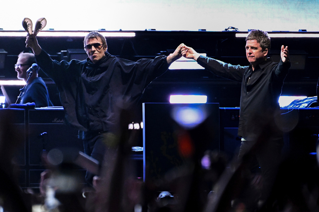 FILE - Liam Gallagher, left, and Noel Gallagher of Oasis perform on Sunday, Aug. 31, 2025, in East Rutherford, N.J. (Photo by Evan Agostini/Invision/AP, File)