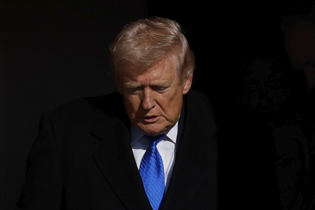 President Donald Trump disembarks Air Force One upon his arrival at Joint Base Andrews, Md., Monday, March 23, 2026.(AP Photo/Luis M. Alvarez)