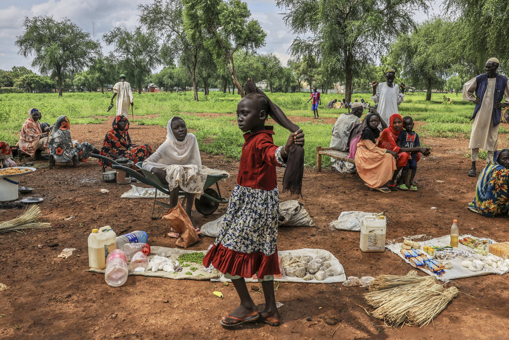 Women sell goods at a small market in the Gendrassa Refugee Camp, Maban, South Sudan, Wednesday, Aug. 20, 2025. (AP Photo/Caitlin Kelly)