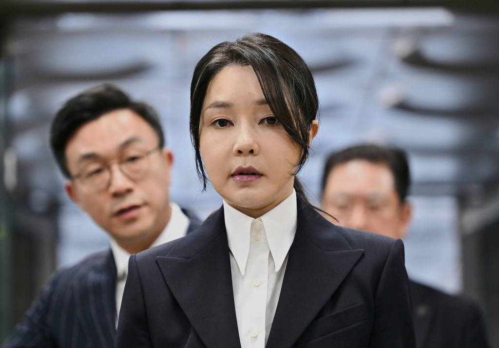 FILE - South Korea's former first lady Kim Keon Hee, wife of former president Yoon Suk Yeol, arrives at a court to attend a hearing to review her arrest warrant requested by special prosecutors, in Seoul, South Korea, on Aug. 12, 2025. (Jung Yeon-je/Pool Photo via AP, File)
