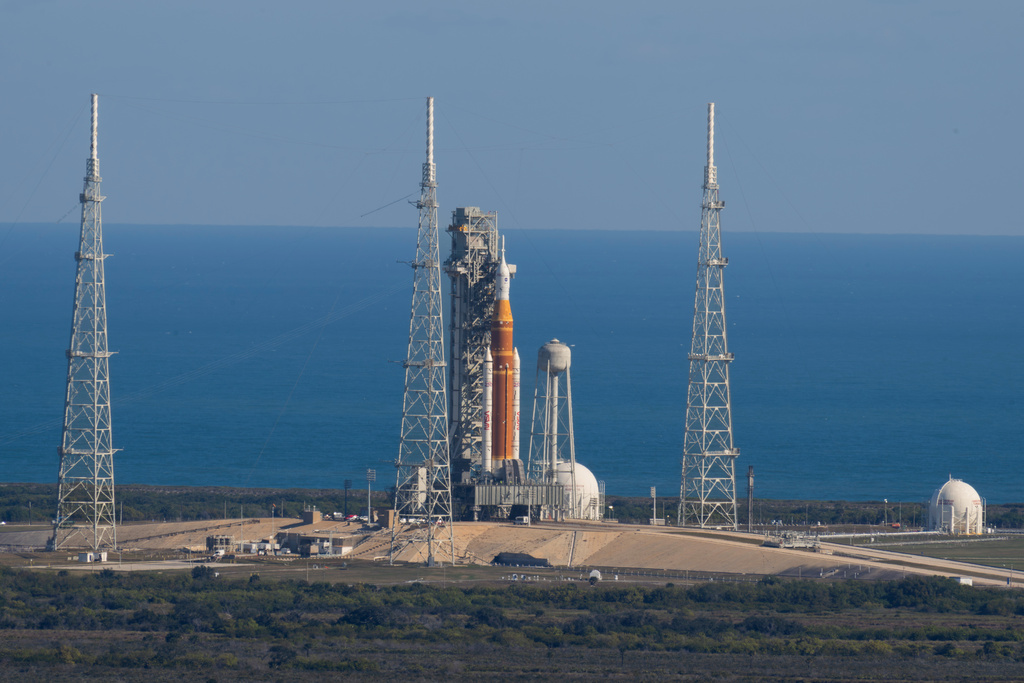 This photo provided by NASA shows the Artemis II SLS (Space Launch System) rocket with the Orion spacecraft atop a mobile launcher at Launch Complex 39B, Thursday, Jan. 29, 2026, at NASA's Kennedy Space Center in Florida. (Jim Ross/NASA via AP)