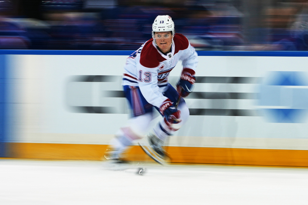 Montréal Canadiens' Cole Caufield (13) drives toward the net during the third period of an NHL hockey game against the New York Rangers Thursday, April 2, 2026, in New York. (AP Photo/Frank Franklin II)
