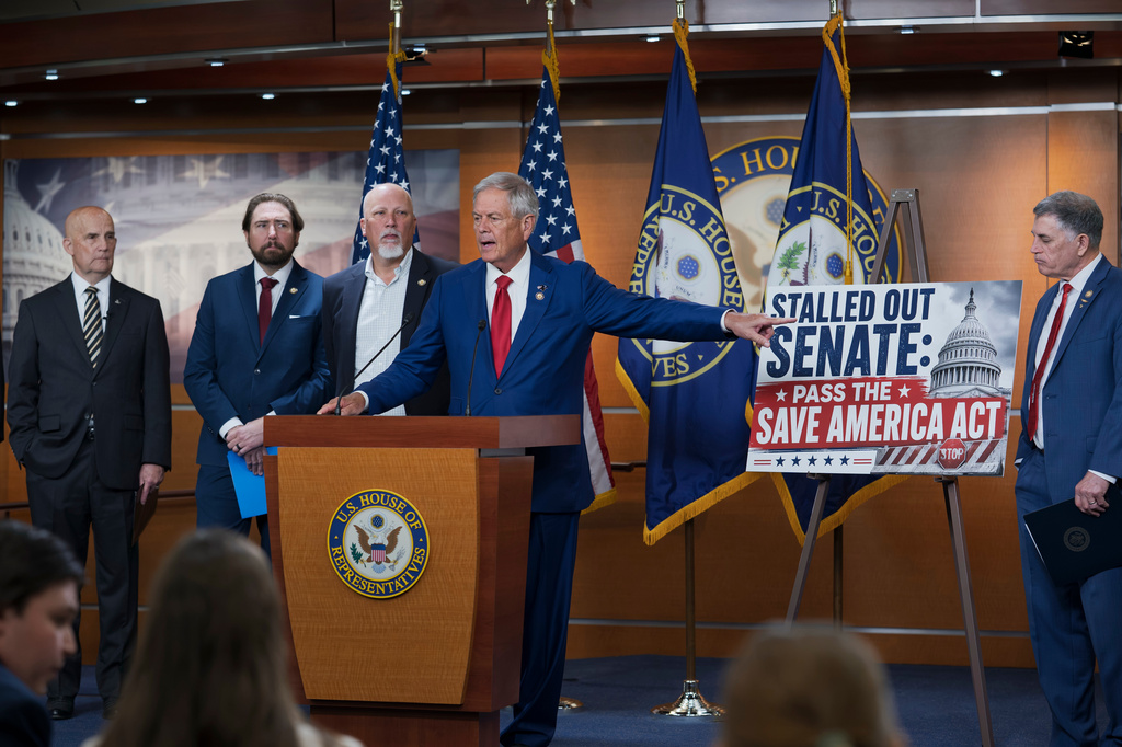 FILE - Rep. Ralph Norman, R-S.C., center, is joined by members of the conservative House Freedom Caucus as they criticize the Senate for not acting on the Save America Act at the Capitol in Washington, Thursday, June 25, 2026. (AP Photo/J. Scott Applewhite, File)