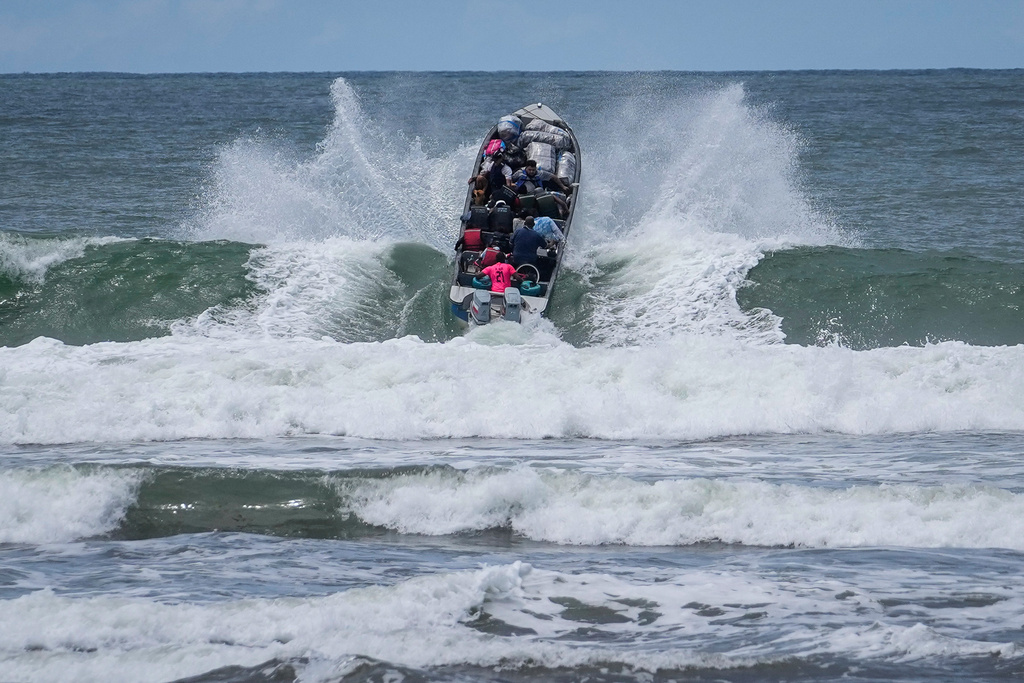 Venezuelan migrants depart Jaque on Panama's Pacific coast en route to Jurado, Colombia, as they return home after failing to enter the United States, Sept. 19, 2025. (AP Photo/Matias Delacroix, File)