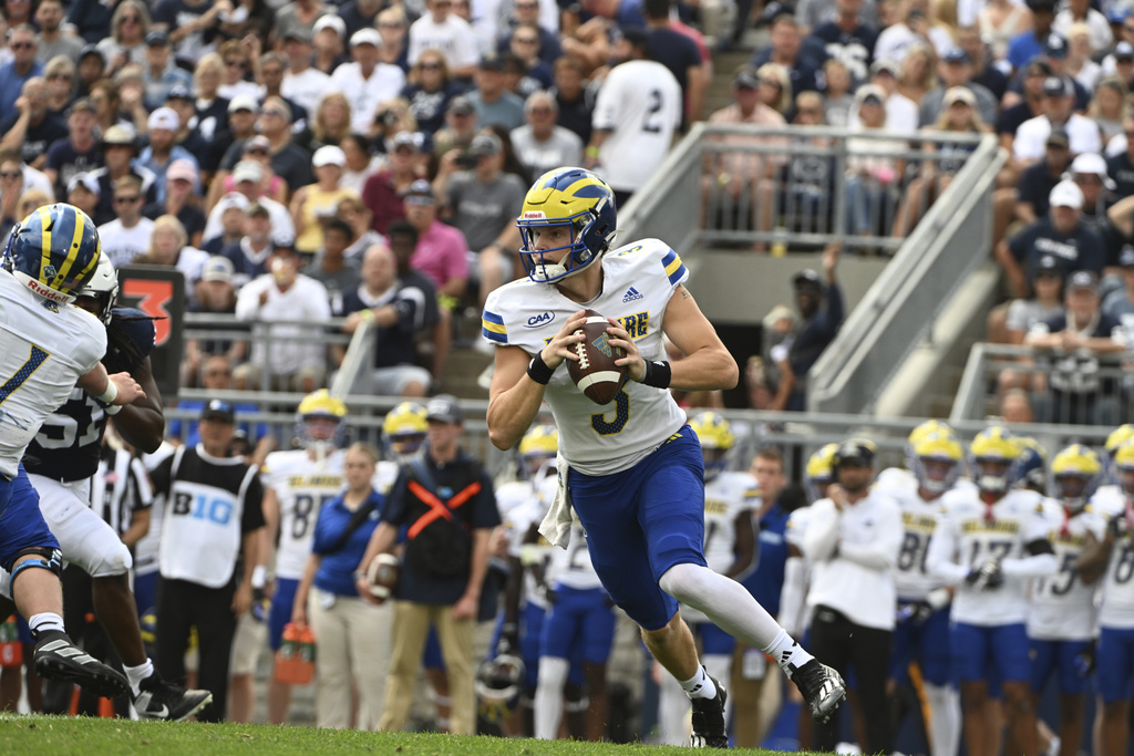 FILE - Delaware quarterback Zach Marker (3) looks to pass during the first half of an NCAA college football game against Penn State, Sept. 9, 2023, in State College, Pa. (AP Photo/Barry Reeger, File)