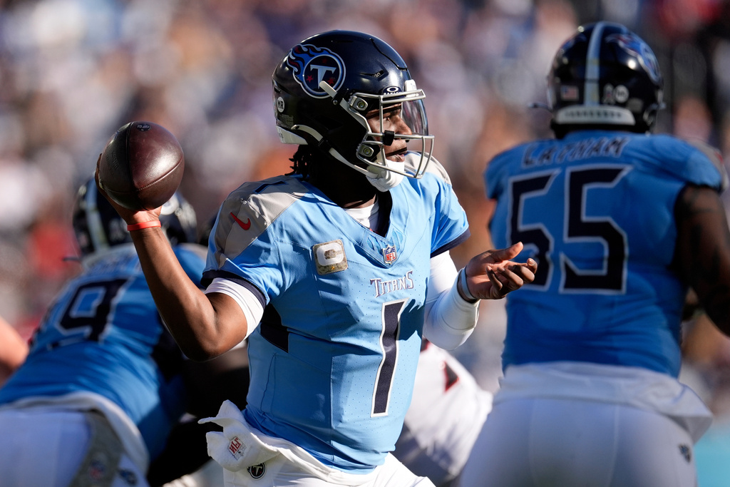 Tennessee Titans quarterback Cam Ward passes against the Houston Texans during the second half of an NFL football game on Sunday, Nov. 16, 2025, in Nashville, Tenn. (AP Photo/George Walker IV)