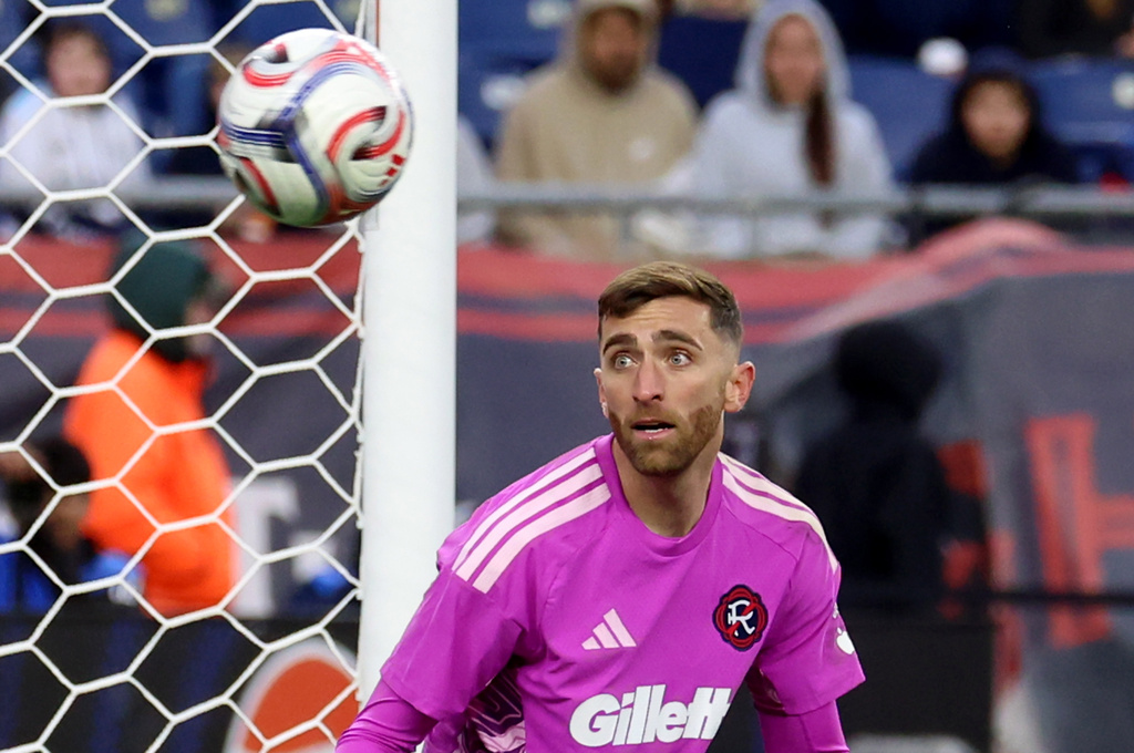 New England Revolution goalkeeper Matt Turner watches the ball sail by the net on a shot by CF Montreal in the second half of an MLS soccer match, Saturday, April 4, 2026, in Foxborough, Mass. (AP Photo/Mark Stockwell)