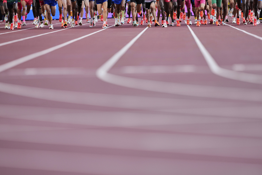 Runners start the men's marathon at the World Athletics Championships in Tokyo, Monday, Sept. 15, 2025. (AP Photo/Petr David Josek)