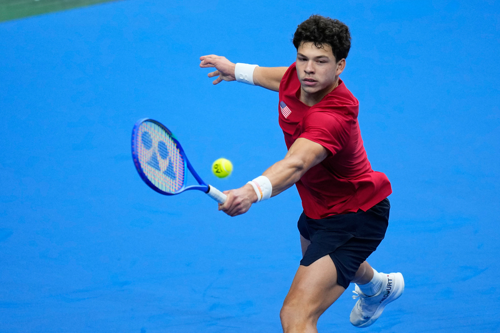 United States' Ben Shelton returns the ball to Czechia's Jakub Mensik during the Davis Cup second round qualifier match between the Czech Republic and the United States, in Prague, Saturday, Sept. 19, 2026. (AP Photo/Petr David Josek)