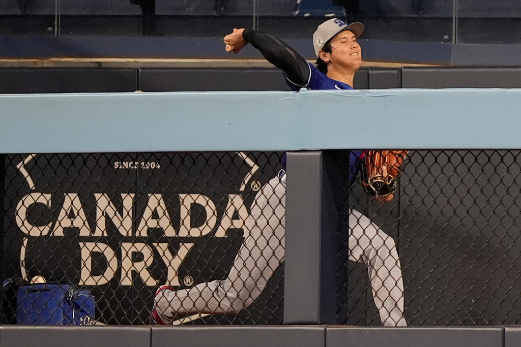 Los Angeles Dodgers' Shohei Ohtani throws in the bullpen during a World Series baseball media day, Thursday, Oct. 23, 2025, in Toronto. The Toronto Blue Jays face the Los Angeles Dodgers in Game 1 on Friday. (AP Photo/Brynn Anderson)