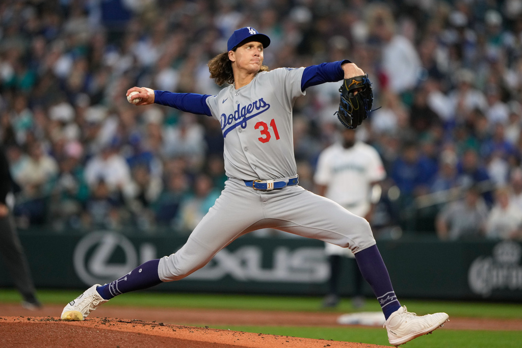 Los Angeles Dodgers starting pitcher Tyler Glasnow delivers a pitch during the first inning of a baseball game against the Seattle Mariners, Saturday, Sept. 27, 2025, in Seattle. (AP Photo/Ryan Sun)