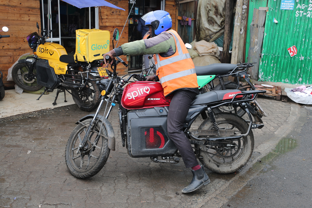 FILE - A rider sits on an electric Spiro motorcycle in Nairobi, Kenya, on Feb. 24, 2026. (AP Photo/Henry Naminde, File)