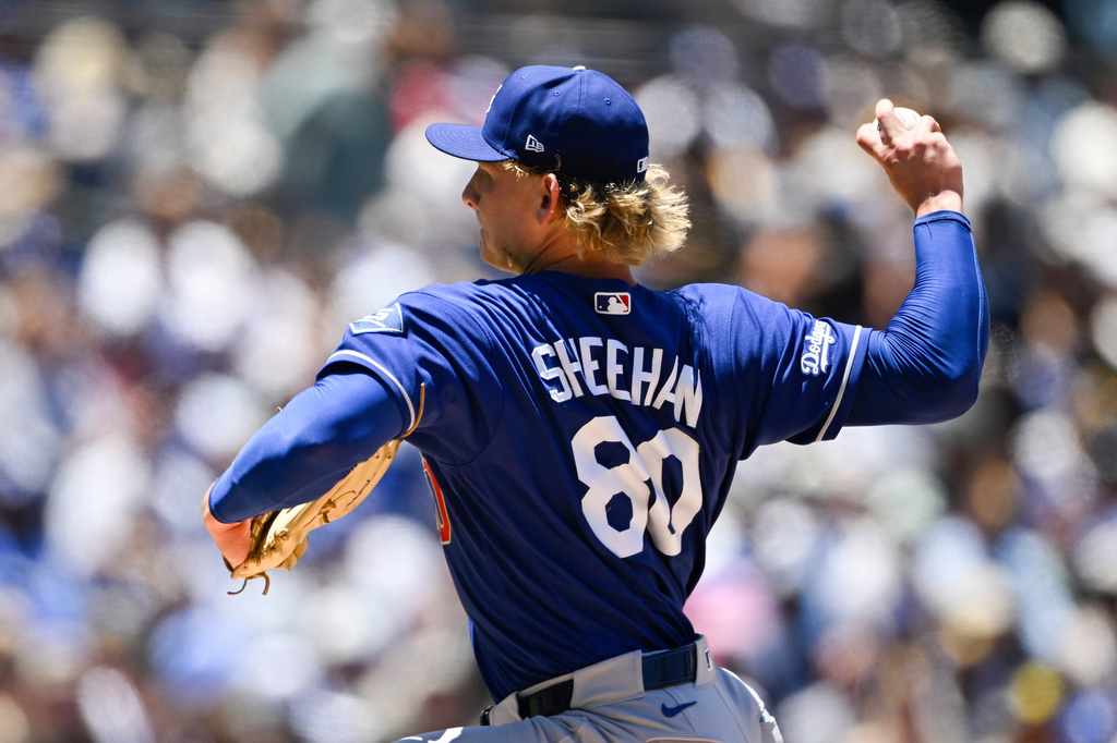 Los Angeles Dodgers pitcher Emmet Sheehan delivers during the first inning of a baseball game against the San Diego Padres, Sunday, June 28, 2026, in San Diego. (AP Photo/Denis Poroy)