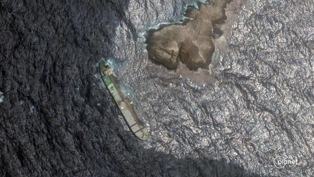 This satellite image from Planet Labs PBC shows crude oil leaking and spreading from the sanctioned Suezmax tanker Caroline Bezengi grounded off the coast of Oman, on Friday, July 31, 2026. (Planet Labs PBC via AP)