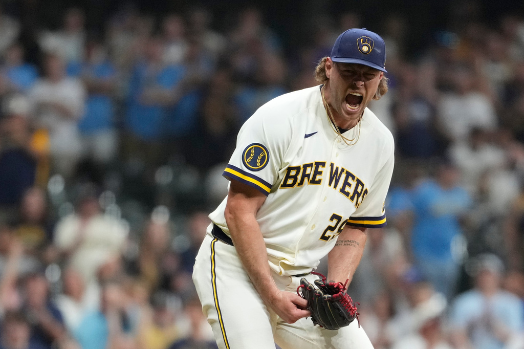 Milwaukee Brewers' Trevor Megill reacts after recording a save during the ninth inning of a baseball game against the Pittsburgh Pirates, Wednesday, Aug. 5, 2026, in Milwaukee. (AP Photo/Aaron Gash)