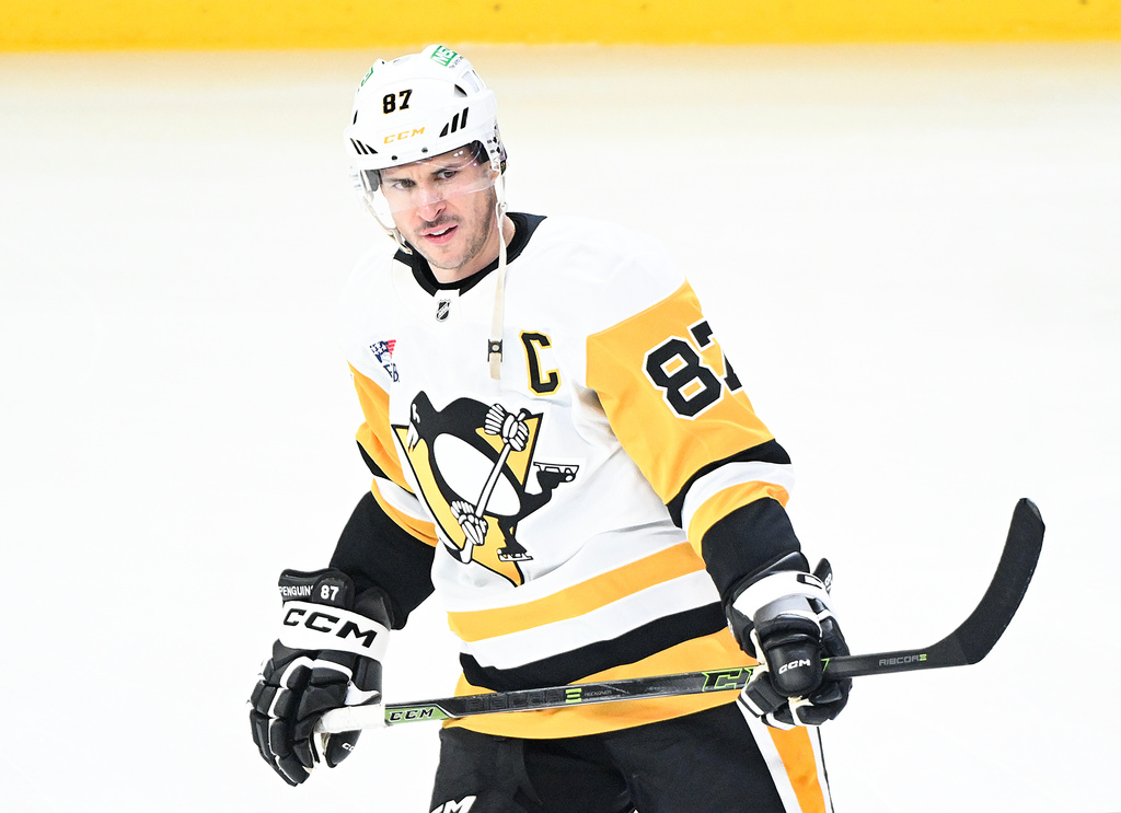 Pittsburgh Penguins' Sidney Crosby skates prior to an NHL hockey game against the Montreal Canadiens in Montreal, Saturday, Dec. 20, 2025. (Graham Hughes/The Canadian Press via AP)