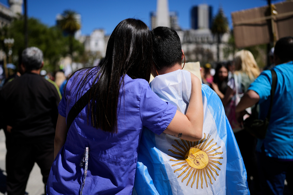People protest demanding the government of President Javier Milei enact a bill expanding protections for people with disabilities, in Buenos Aires, Argentina, Wednesday, Oct. 1, 2025. (AP Photo/Natacha Pisarenko)