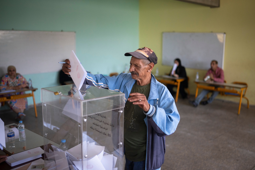 A man casts his vote inside a polling station during the legislative elections in Rabat, Morocco, Wednesday, Sept. 23, 2026. (AP Photo/Mosa'ab Elshamy)