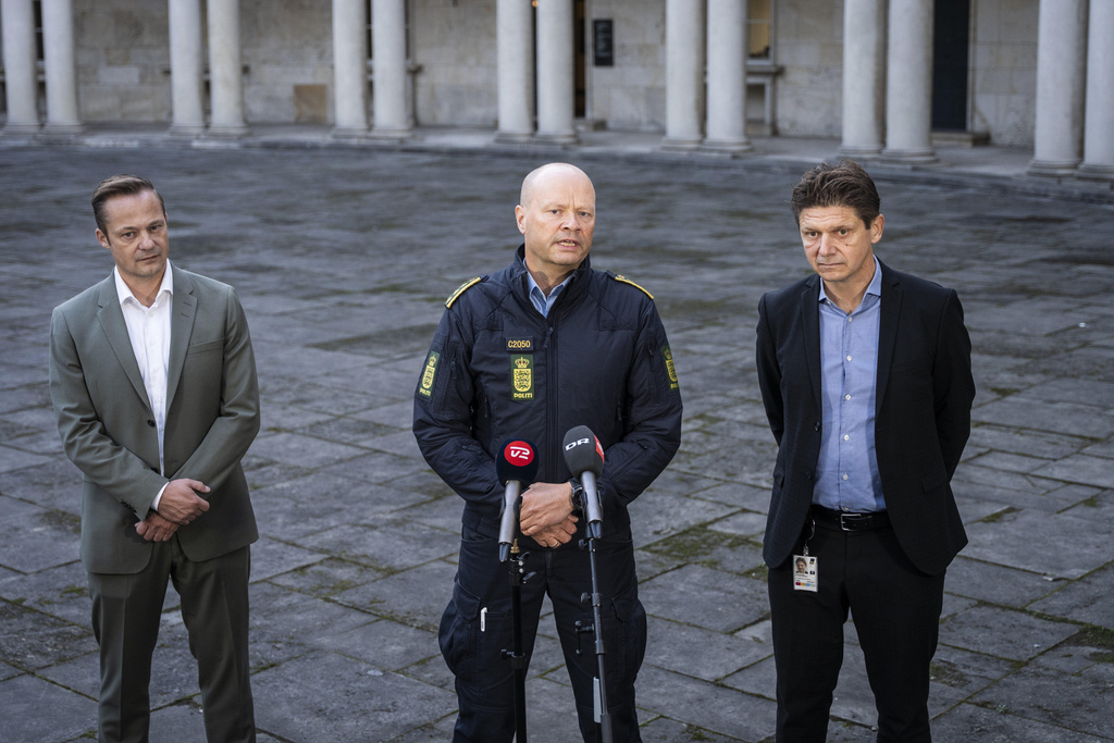 Naviair Director Morten Fruensgaard, left, police inspector Jens Jespersen, centre, and operations manager at Naviair Kristoffer Plenge-Brandt hold a joint press conference at police headquarters in Copenhagen, Denmark, Tuesday Sept. 23, 2025, after drones were seen on Monday evening near Copenhagen Airport and the airspace over Copenhagen was closed for four hours into Tuesday. (Emil Helms/Ritzau Scanpix via AP)