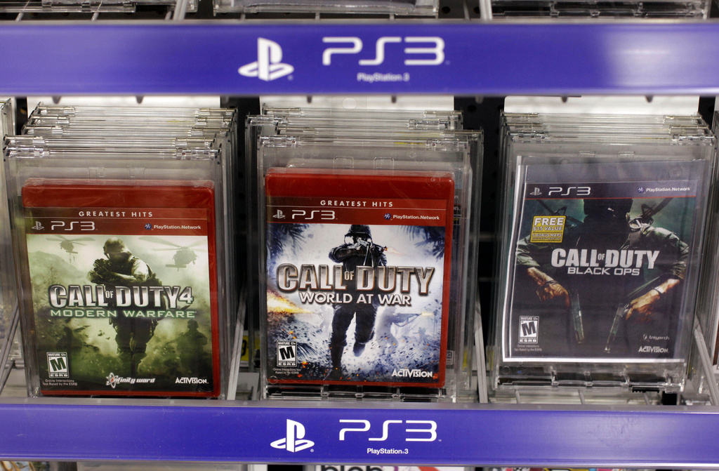 FILE - Three versions of Activision's Call Of Duty games are seen on sale at Best Buy, in Mountain View, Calif., Wednesday, Aug. 3, 2011. (AP Photo/Paul Sakuma, File)