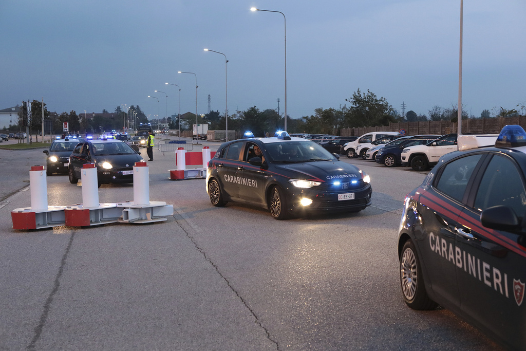 FILE - Carabinieri (Italian paramilitary police) patrol ahead of the Nations League soccer match between Italy and Israel, outside the Bluenergy stadium in Udine, Italy, Monday, Oct. 14, 2024. (Andrea Bressanutti/LaPresse via AP, file)