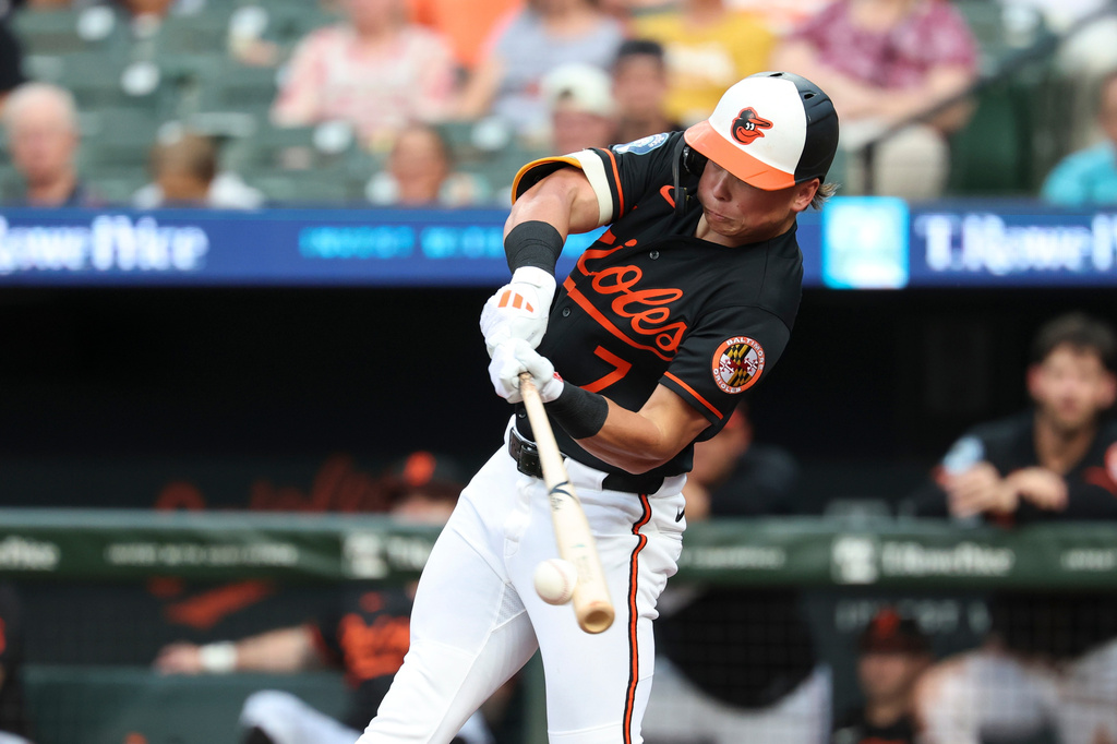 Baltimore Orioles' Jackson Holliday hits a single off Chicago Cubs pitcher Colin Rea during the third inning of a baseball game, Wednesday, July 8, 2026, in Baltimore. (AP Photo/Terrance Williams)